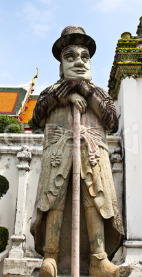 Statue of Man at Wat Pho in Bangkok, Thailand.