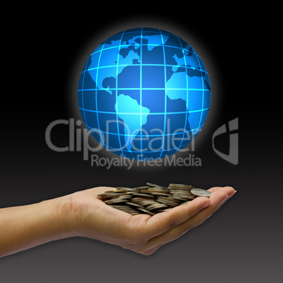 Concept hand and coin with globe.