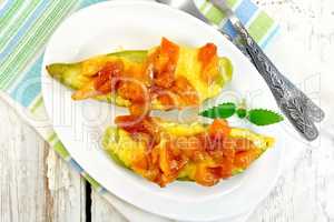 Courgettes in spicy sauce on board top