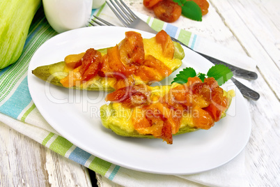 Courgettes in spicy sauce on light board