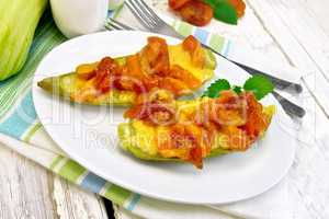 Courgettes in spicy sauce on light board