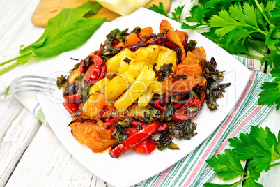 Courgettes with vegetables in plate on napkin