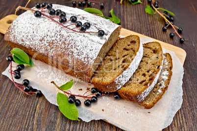 Fruitcake bird cherry cut on board