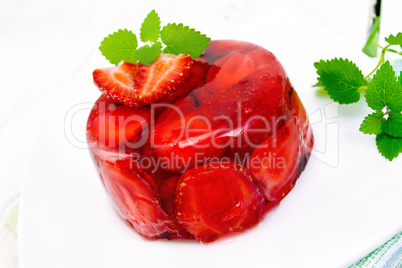 Jelly strawberry with mint on napkin and light board