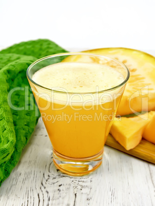 Juice pumpkin with napkin on light board