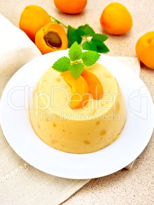 Panna cotta apricot with fruit on table