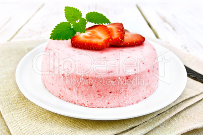 Panna cotta strawberry with mint on board