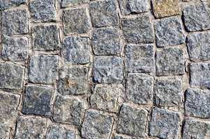 Pavement of granite square tiles