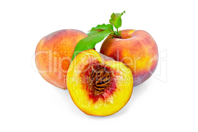 Peaches with green leaves