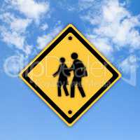 School warning sign on yellow with a blue sky background