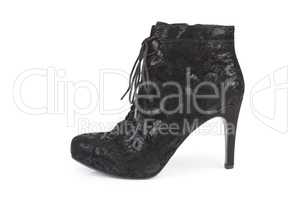 Black ankle boot isolated on white