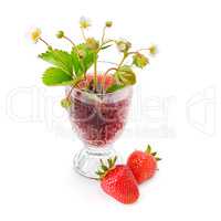 strawberries and strawberry juice in a glass isolated on white b