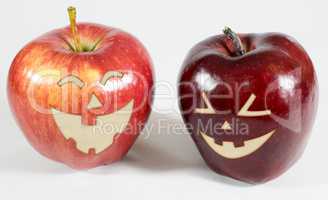 Halloween - Äpfel mit lachenden Gesichtern