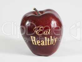 Roter Apfel mit der Aufschrift Eat Healthy