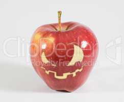 Halloween - Apfel mit grimmigen Gesicht