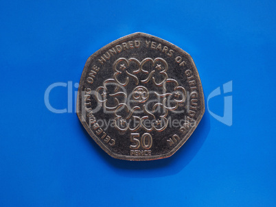 50 pence coin, United Kingdom over blue