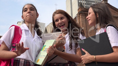 Teen Female Students With Textbooks