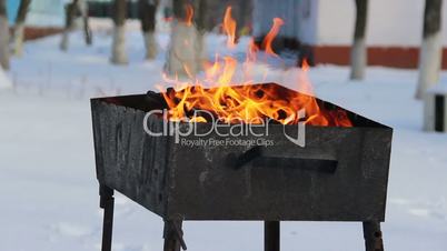 winter barbeque fire