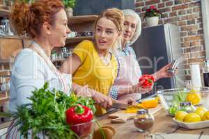 Family cooking together in kitchen