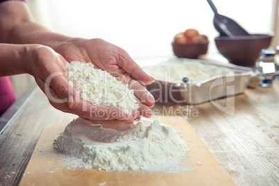 Flour in female hands