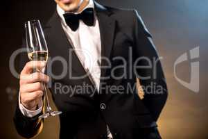 Man holding champagne glass
