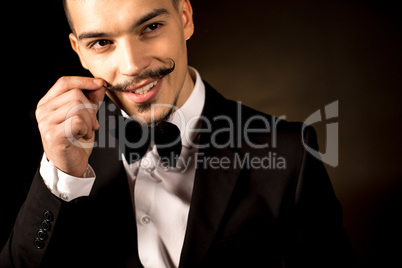 Smiling man in tuxedo