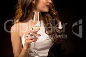 Woman holding champagne glass