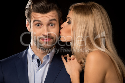Woman kissing a man