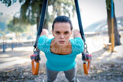 Serious woman training in the park