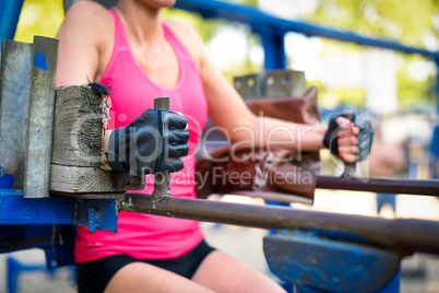 Woman exercising on sport equipment