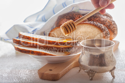 Braided Challah bread and honey