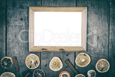 empty picture frame on a wooden surface