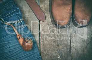 Casual clothing on a wooden background, vintage toning