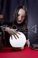 Fortune teller with a magic ball