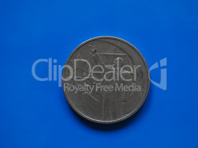 Vintage Russian ruble coin over blue