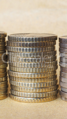 Euro coins pile - vertical Euro coins pile - vertical