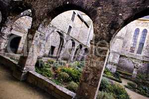 Saint-Magloire Abbey, cloister and garden in Lehon