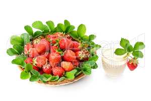 strawberries in a basket and berry smoothies isolated on white b