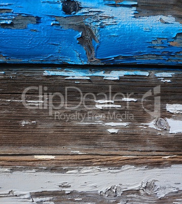 Alte Holzwand mit abgeplatzter Farbe blau und weiß