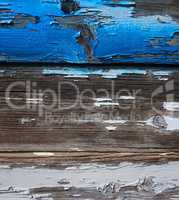 Alte Holzwand mit abgeplatzter Farbe blau und weiß