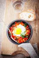 Traditional middle eastern dish of shakshuka in a pan.