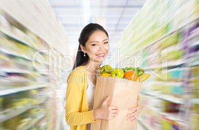 Buying groceries in supermarket
