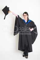 University student hand holding mortarboard