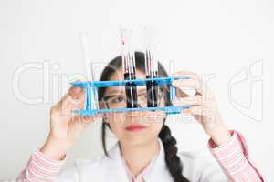 Young Asian female scientist doing research