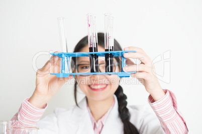 Young Asian female scientist carrying out scientific research