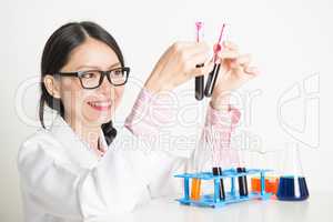 Asian female scientist doing blood experiment