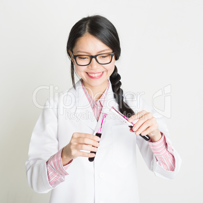 Asian female scientist doing research