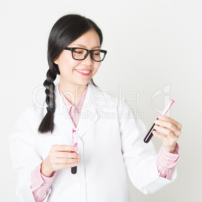 Young female lab assistant