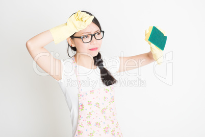 Young Woman Cleaning with sponge