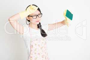 Woman Cleaning with sponge